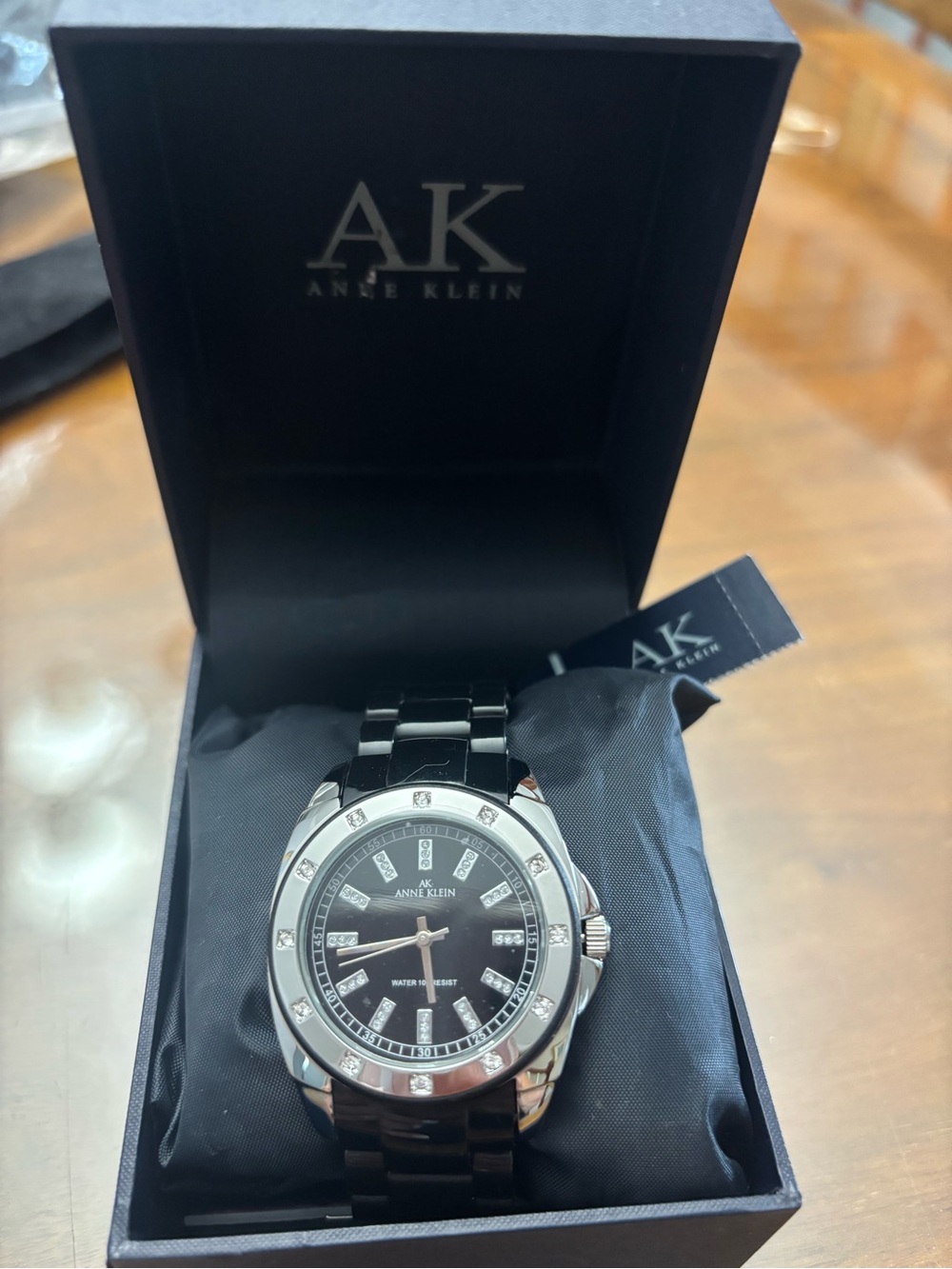 NWT in box.  Anne Klein Black and Silver Women's Ceramic-Link Watch